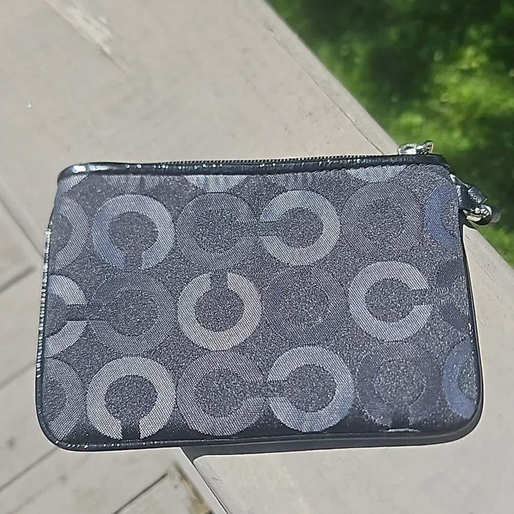 Coach Op Art logo wristlet